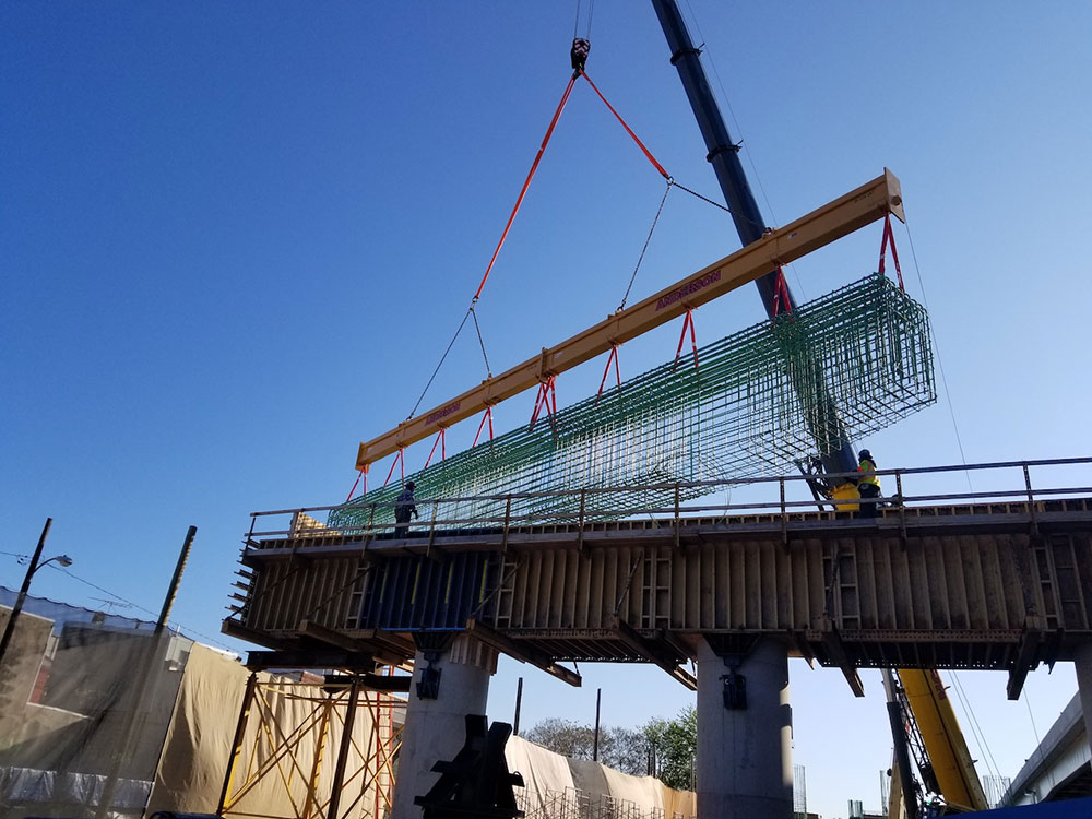 The two-piece beam is currently being used beneath the hook of a 275-ton capacity Grove mobile crane.