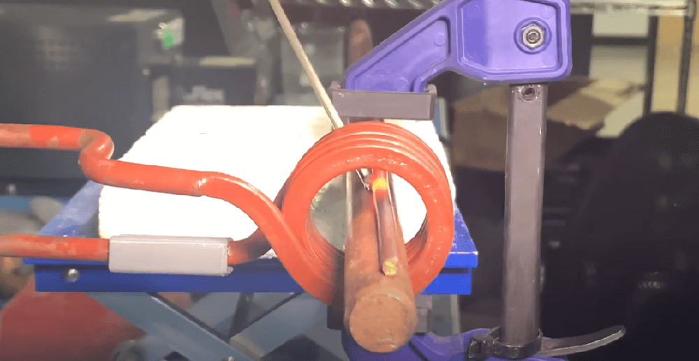 Induction brazing of a steel rod to copper.