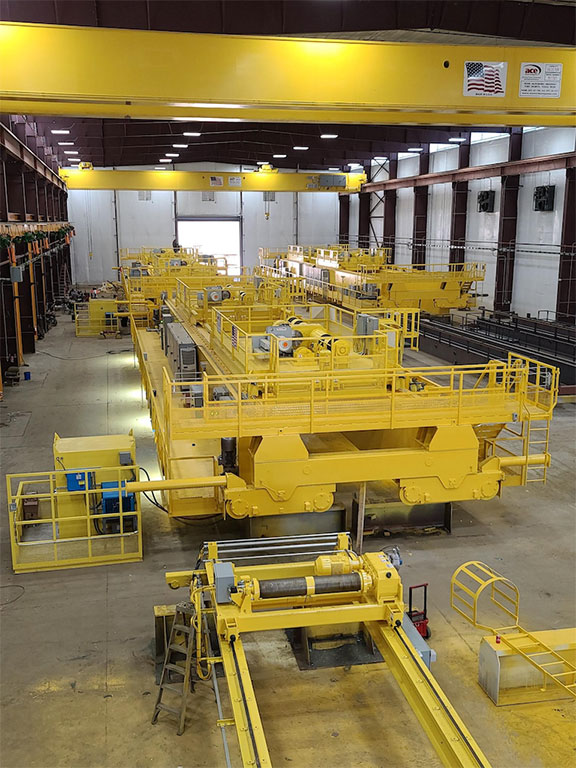 The new site features high-capacity overhead cranes, a 280-ft. girder table and automated gantry welder.
