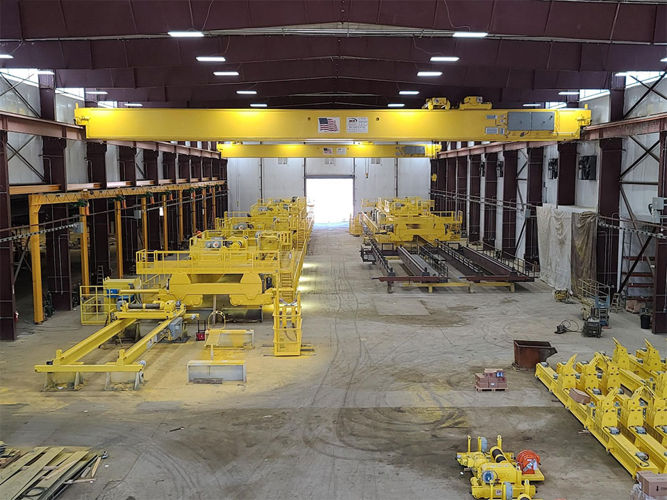 The new site features high-capacity overhead cranes, a 280-ft. girder table and automated gantry welder.