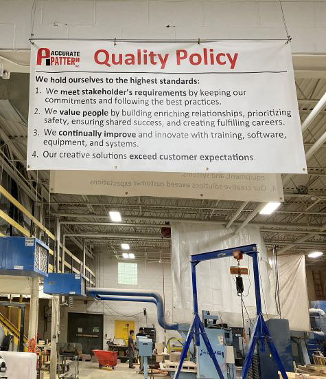 accurate pattern Quality sign reminds the team of the company’s commitment to excellence