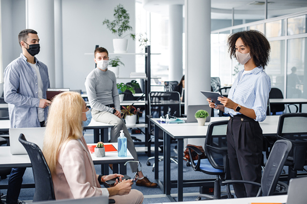 The Definition Of A Safe Workplace Has Involved To Include Social Distancing The Use Of Masks And Routine Wellness Checks GettyImages 1281660191, Industry Today
