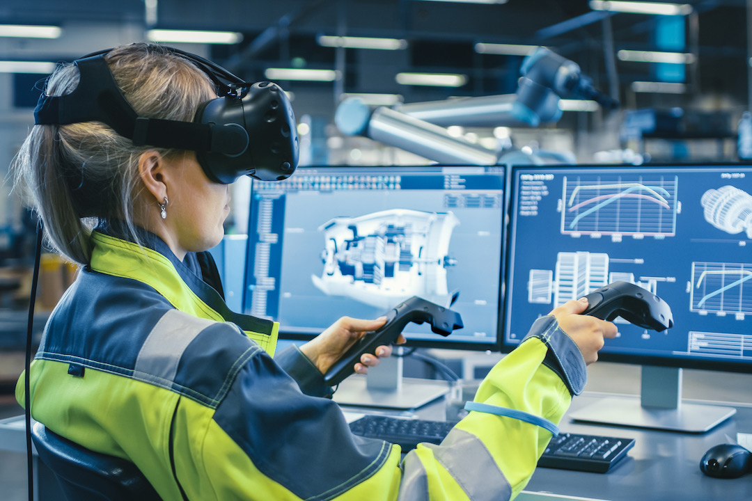 Engineer wearing virtual reality headseat.
