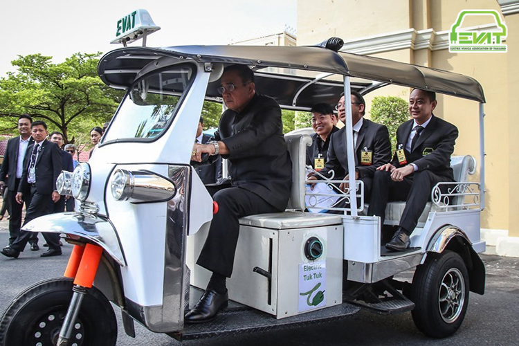 Prime Minister of Thailand, Prayut Chan-o-cha, showcasing an Electric Tuk Tuk vehicle, manufactured in Thailand.
