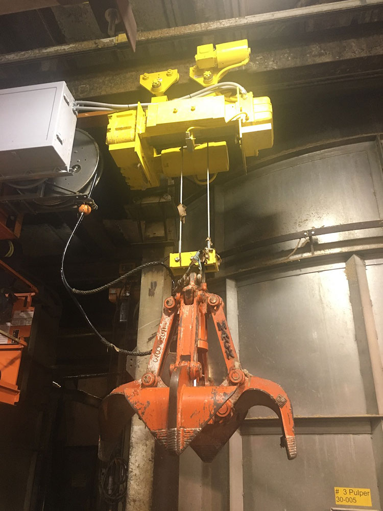 The Wright Work-Rated electric wire rope hoist is installed on a 42.9 ft.-long beam with a 4 ft. radius curve.