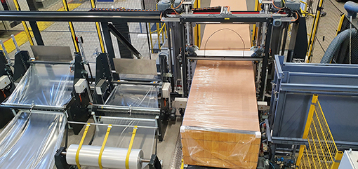 A stack of Ruukki sandwich panels is packed and sealed in one operation with the RoRo StretchPack® machine. Ruukki does not need an extra process to cover the panel ends anymore.
