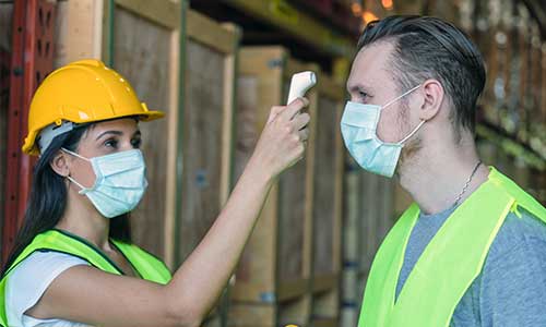 Temperature checks, masks, and onsite visitor guidelines are all potential safety precautions for manufacturers during COVID-19.