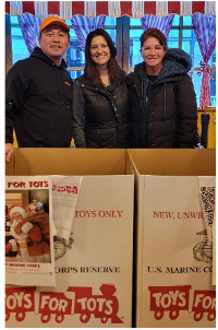 Gebrüder Weiss employees collect gifts for Toys for Tots at its Daley Plaza booth until Thursday, December 15, 2022. The company is the logistics sponsor for the Christkindlmarket in Chicago.