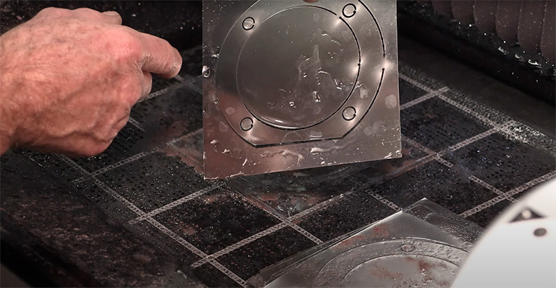Small-format waterjet cutting steel shims for a lathe gearbox repair