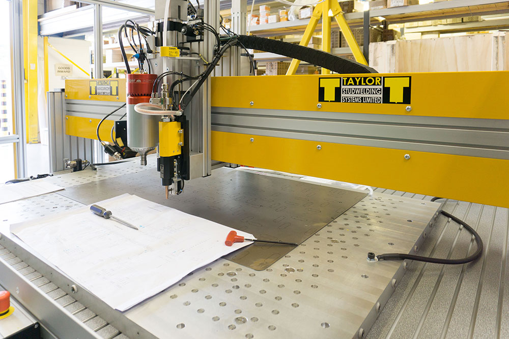 A Taylor Studwelding fully automatic CNC machine which can weld 60 studs per 60 seconds. Image Source: Taylor Studwelding