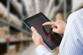 Viewing a mobile device on the warehouse floor.