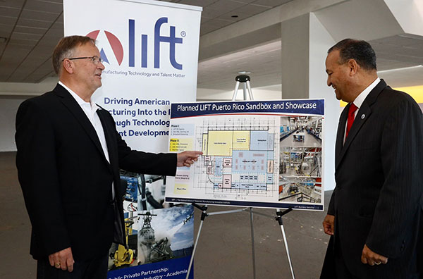 (Left): Nigel Francis, LIFT CEO and Executive Director discusses the new LIFT Puerto Rico initiative with William Miranda Torres, Mayor of Caguas (Right).