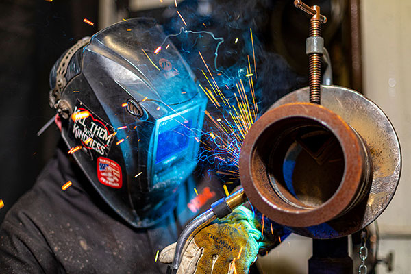 Steamfitter working on a welding project.<br> Image courtesy of Steamfitters Local 601.