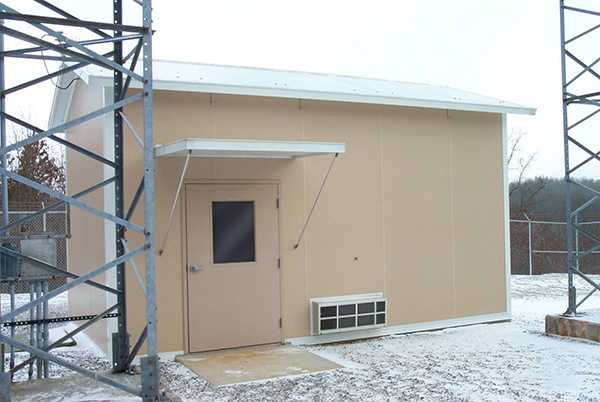 panel built exteriors gable roofed telecom shelter