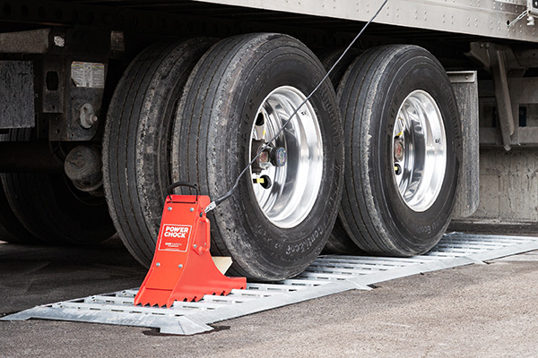 wheel-based vehicle restraint